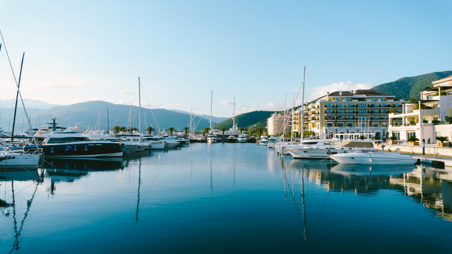 yachts-at-the-pier-against-the-backdrop-of-coastal-travel-tivat-porto-montenegro